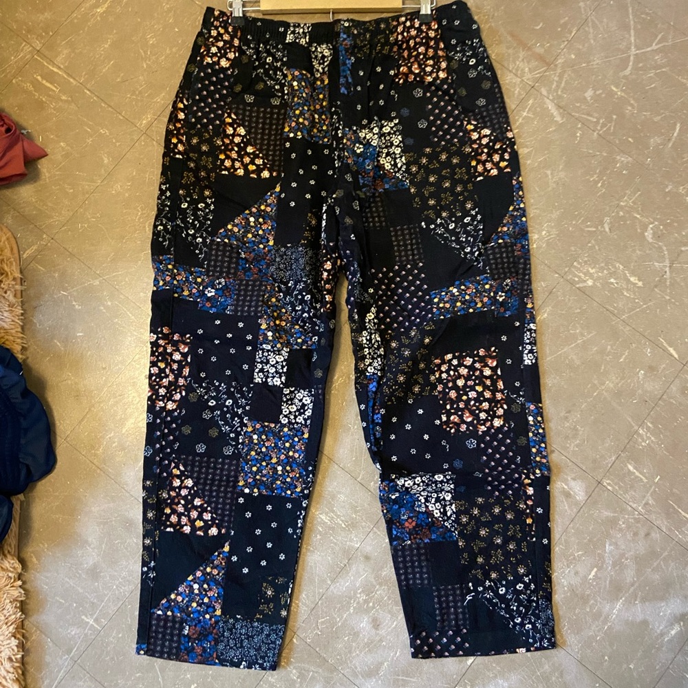 Urban outfitters black pants with crazy designs all over. Good condition!